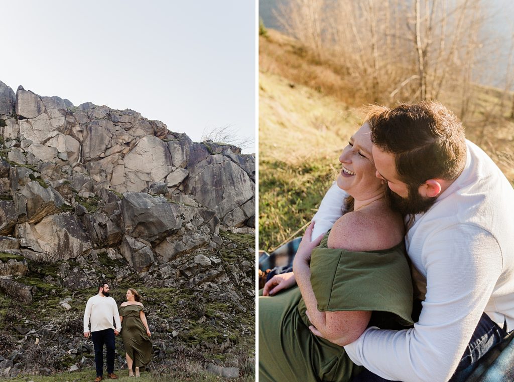 Couple holding hands in front of rocky cliff and sitting together on steep hill Government Cove Oregon Engagement Photography captured by Oregon Engagement Photographer Simply Wandering Photography 