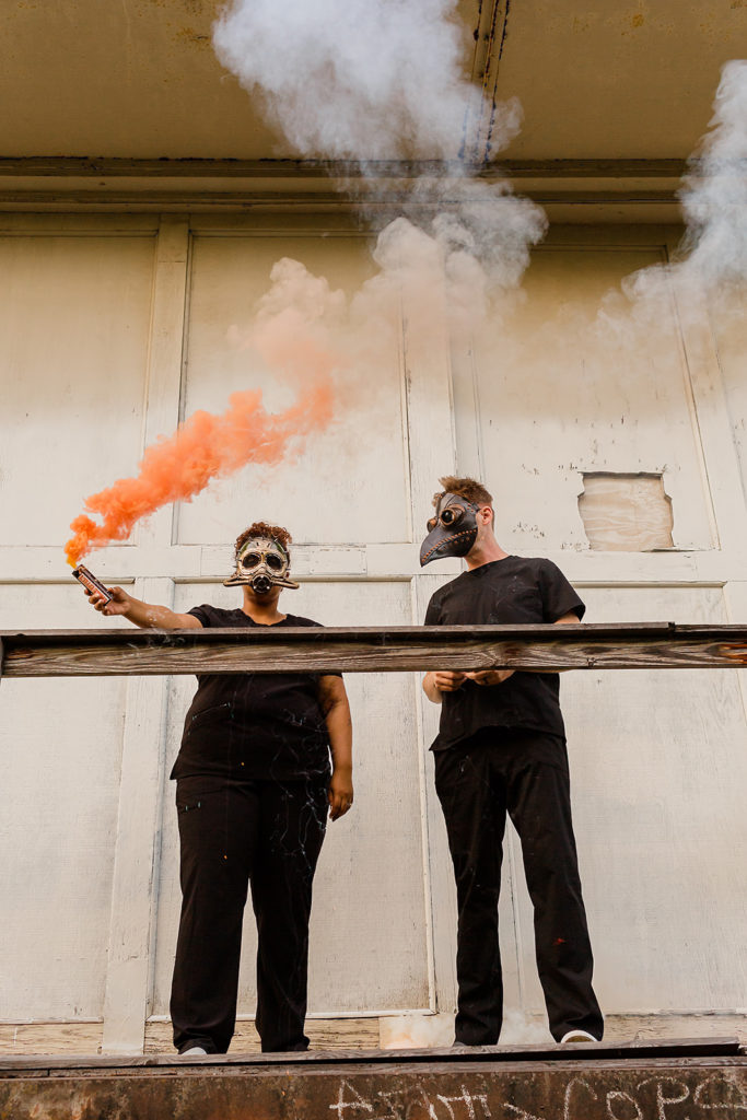 apocalyptic theme engagement session with smoke bombs