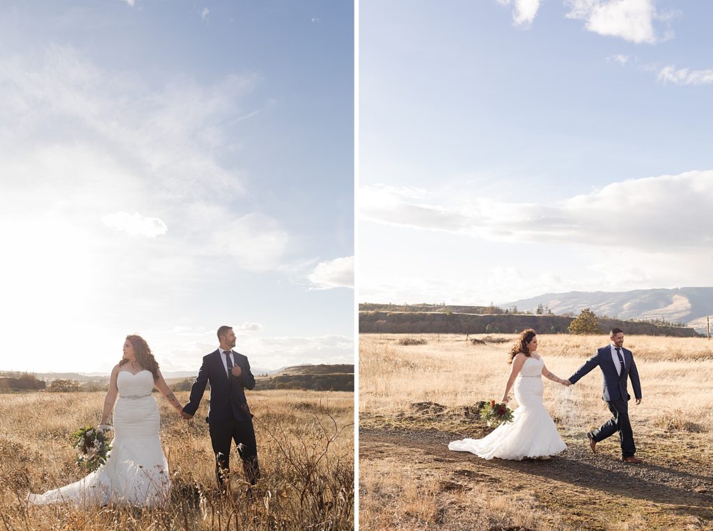 Bride and Groom holding hands and wandering dry grass field together