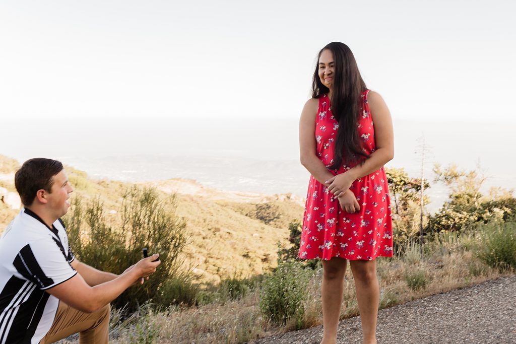 Woman's reaction to man proposing to her Santa Barbara Proposal Photography captured by Oregon Engagement Photographer Simply Wandering Photography 