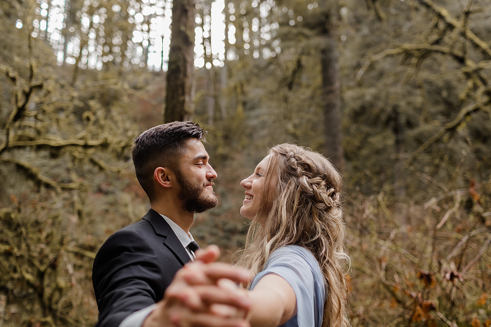 Couple dancing out in the forest Silver Falls State Park Oregon Adventure Photography captured by Simply Wandering Photography 