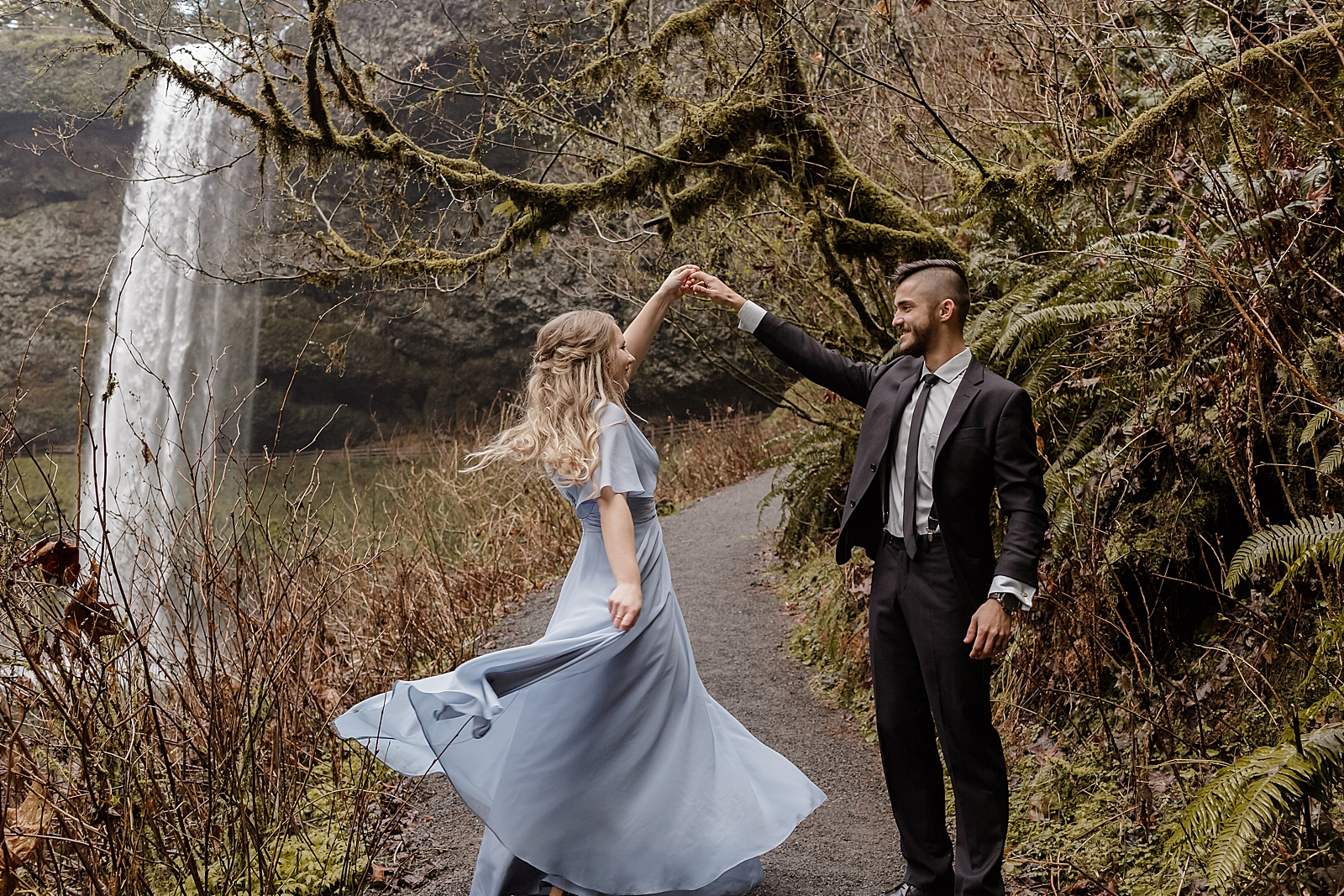 Couple dancing in the forest Silver Falls State Park Oregon Adventure Photography captured by Simply Wandering Photography 