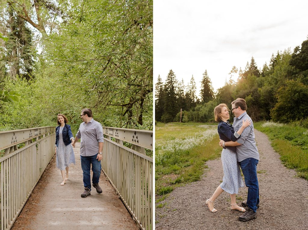 Couple holding hands walking on bridge