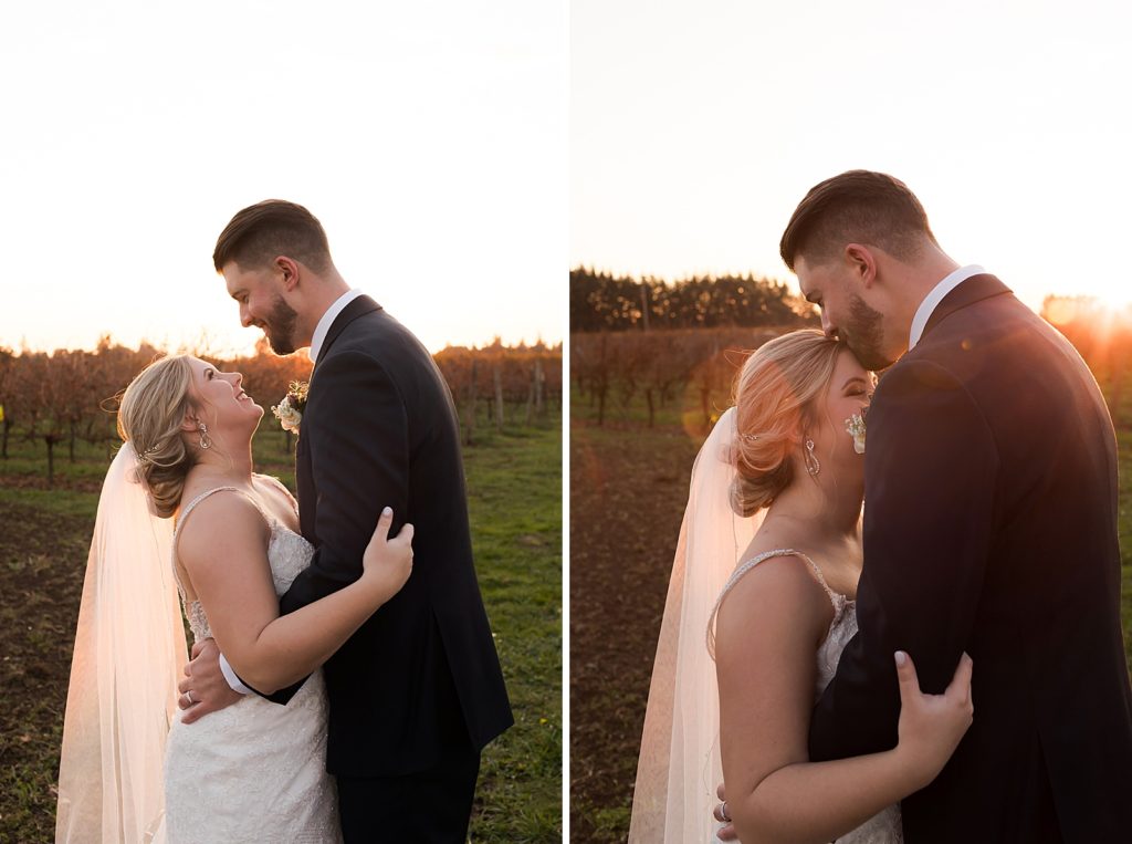 Groom kissing the Bride on the forehead with the sun setting