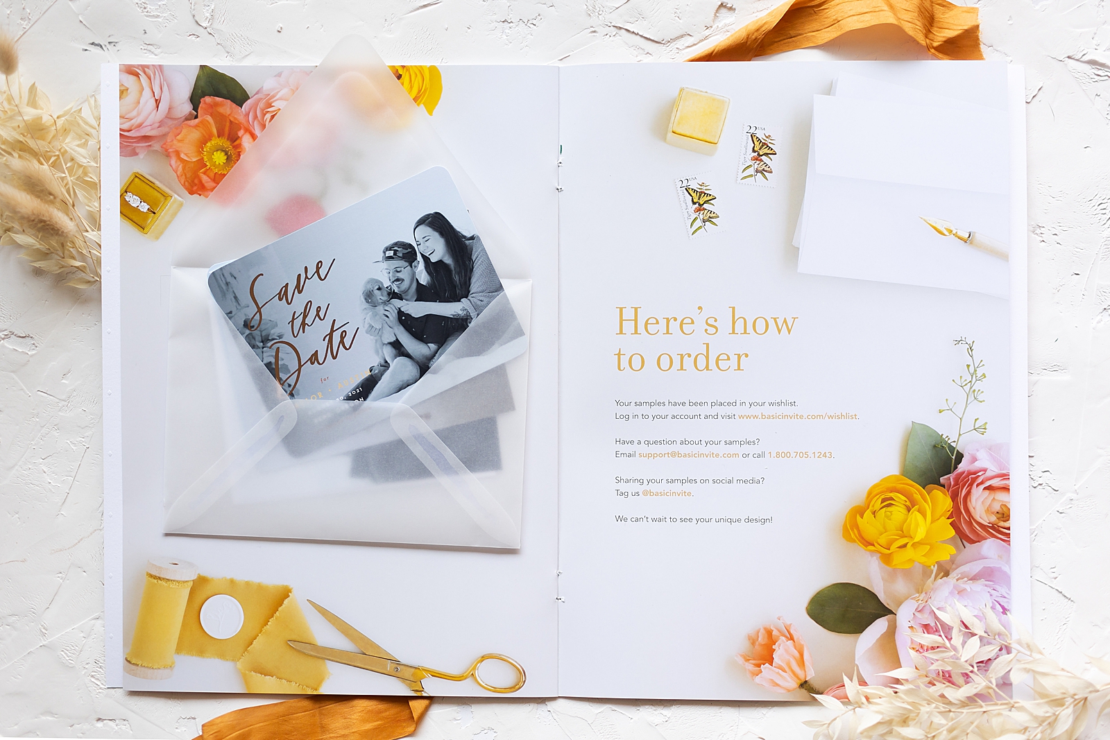 black and white save the date card in vellum envelope on top of colorful info card with instructions on how to order