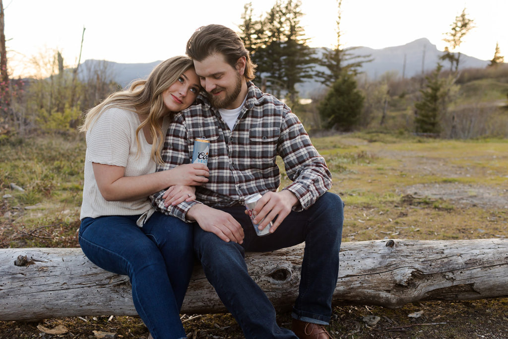 couple sharing a drink during engagement session