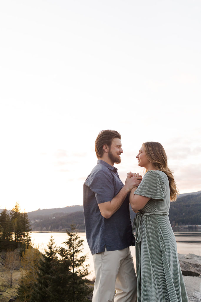 couple hand in hand during oregon engagement session