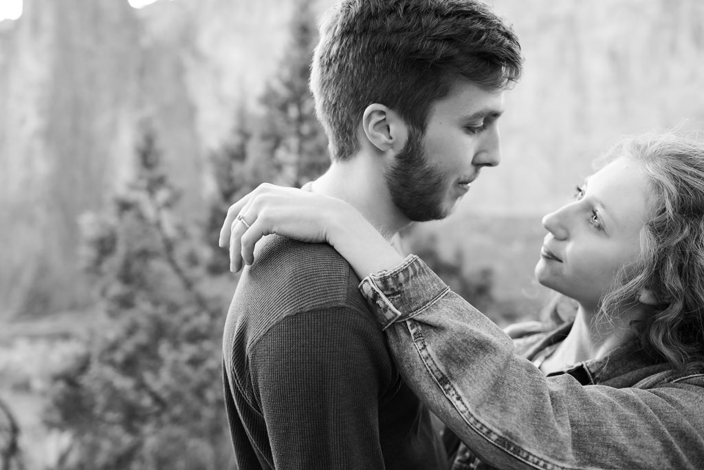 couple looking at each other at Smith Rock Engagement Session